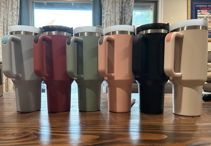 Assorted travel mugs